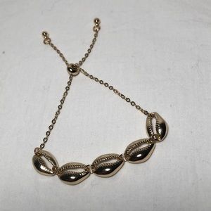 Gold Tone Puka Shell Bracelet Adjustable Slider